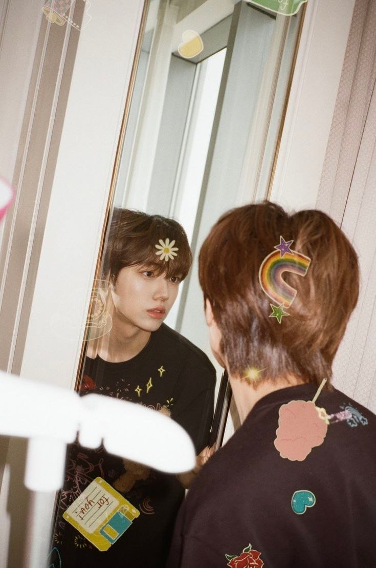 Mychio taking a mirror photo